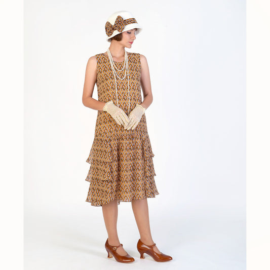 1920s cloche hat in off-white cotton and brown printed chiffon