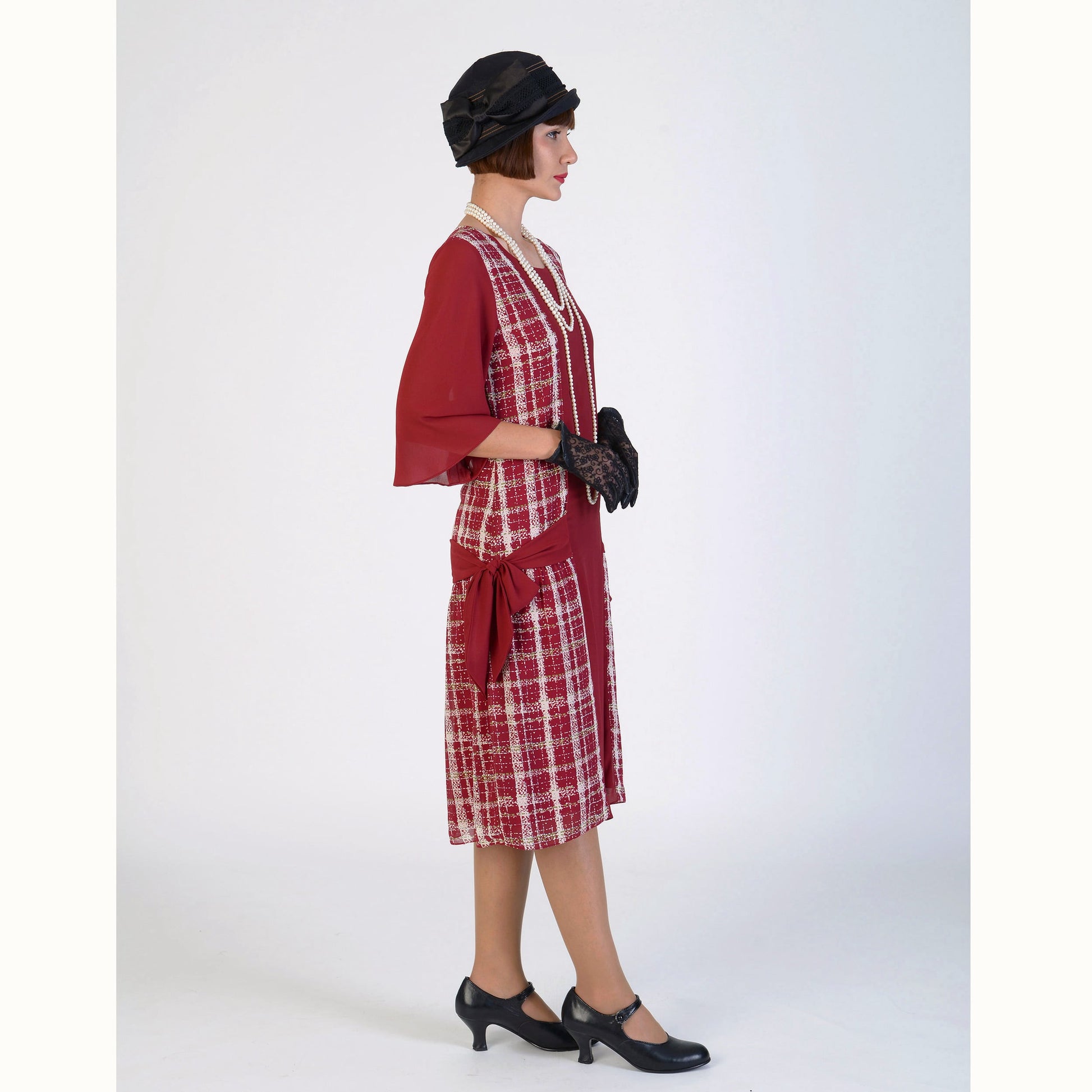 1920s reproduction dress, or Great Gatsby dress or flapper, made with a combination of plaid printed fabric in wine red and white and maroon red solid color. 