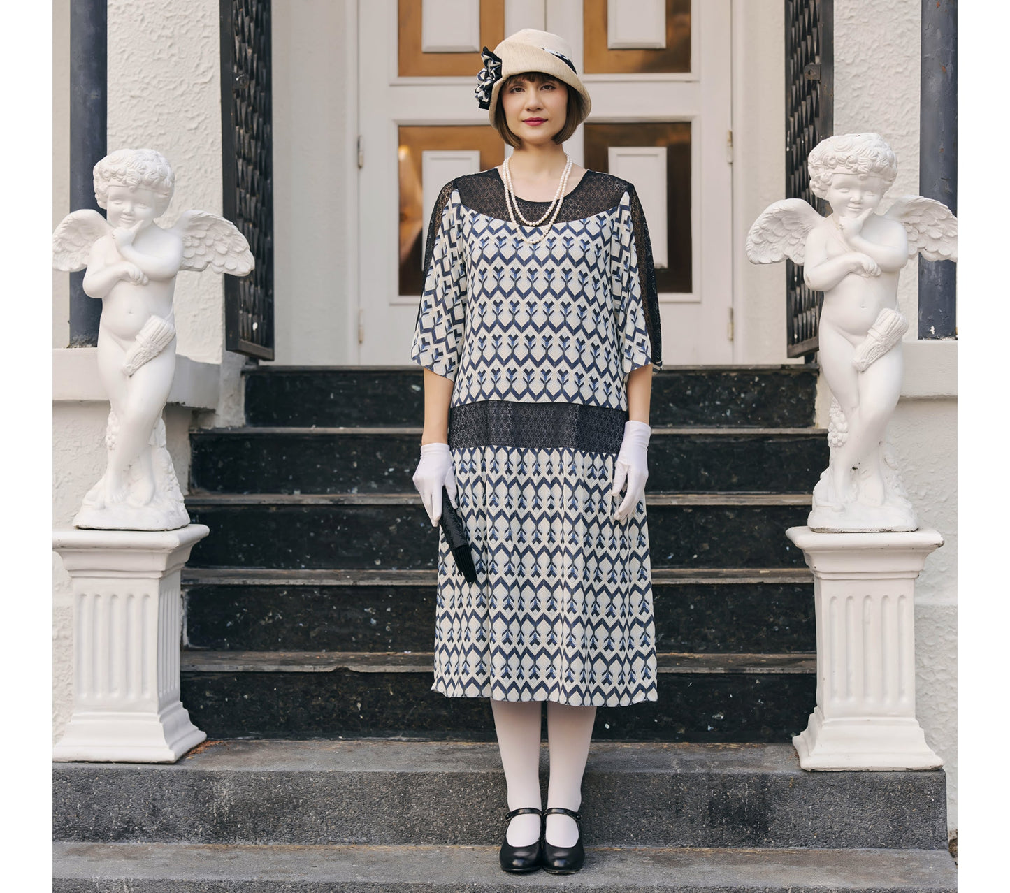 1920s art deco dress made of chiffon and with lace insets and elbow sleeves - a Roaring 20s dress