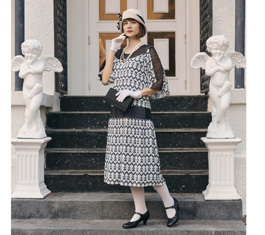 1920s art deco dress made of chiffon and with lace insets and elbow sleeves - a Great Gatsby party dress