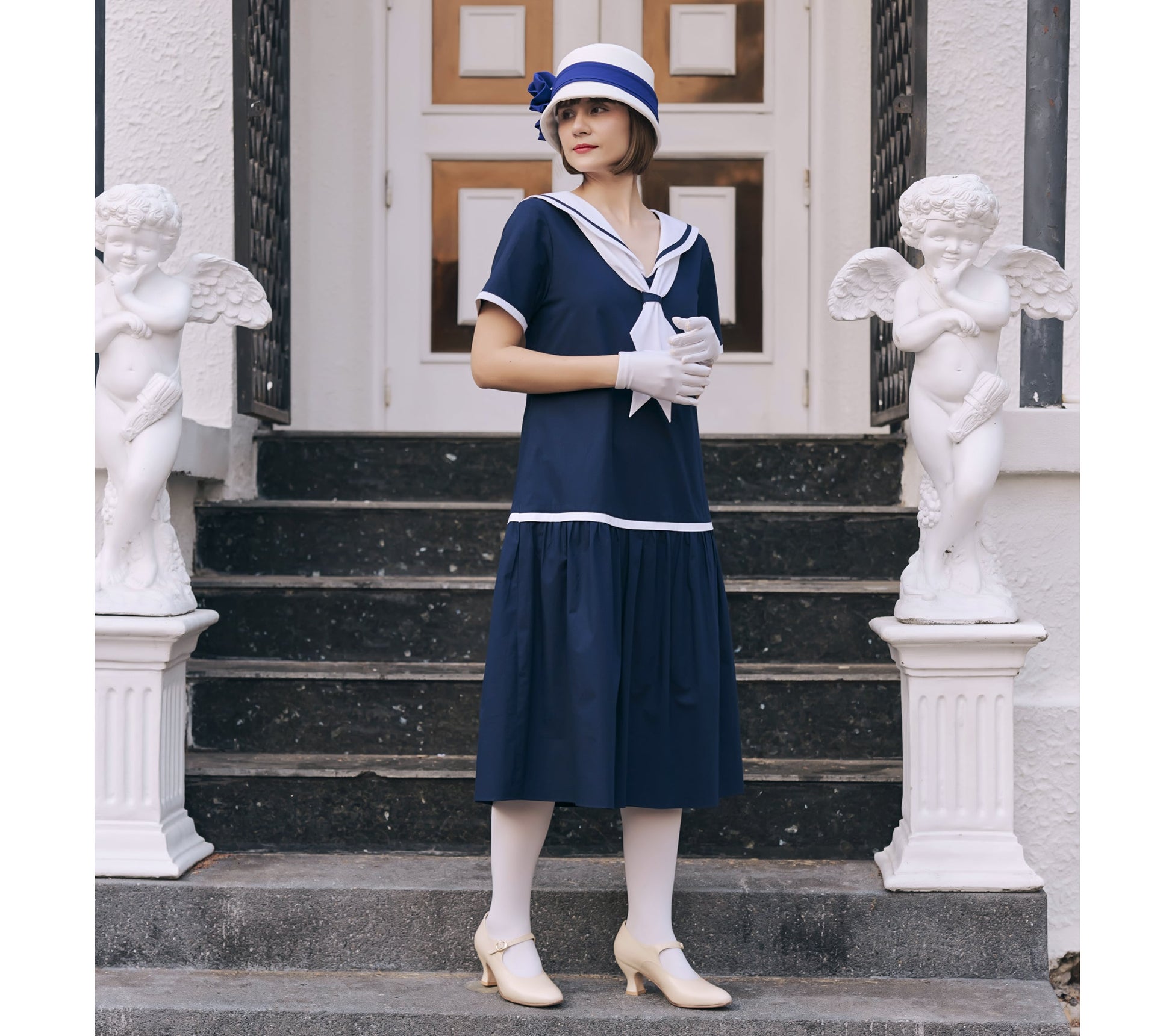 Navy blue and white cotton sailor dress in 1920s look Navy blue and white cotton sailor dress in 1920s look