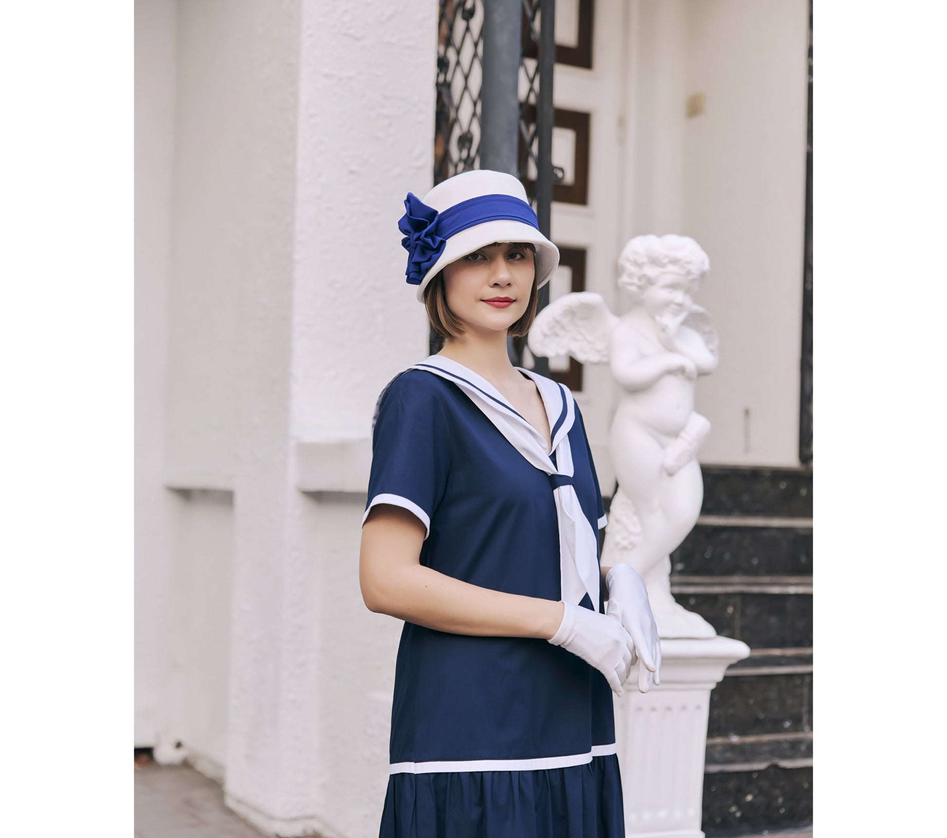 Navy blue and white cotton sailor dress in 1920s look Navy blue and white cotton sailor dress in 1920s look