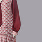 Close up of 1920s dress in red Art Deco print and maroon red contrasting details