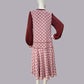 1920s dress in red Art Deco print and maroon red contrasting details