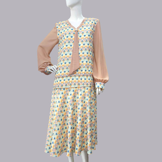 1920s dress with Playful Pastel Art Deco Print and brown Contrast