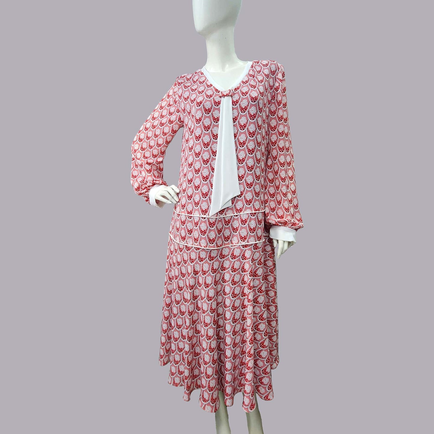 1920s Style Soft Red Art Deco Print Dress with White Tie