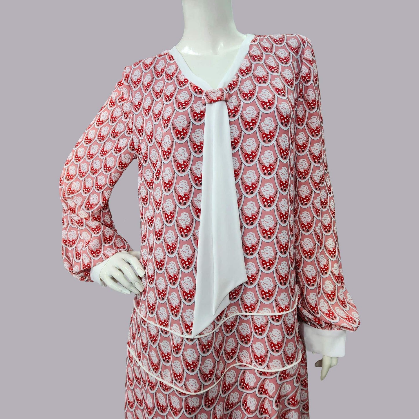 1920s Style Soft Red Art Deco Print Dress with White Tie