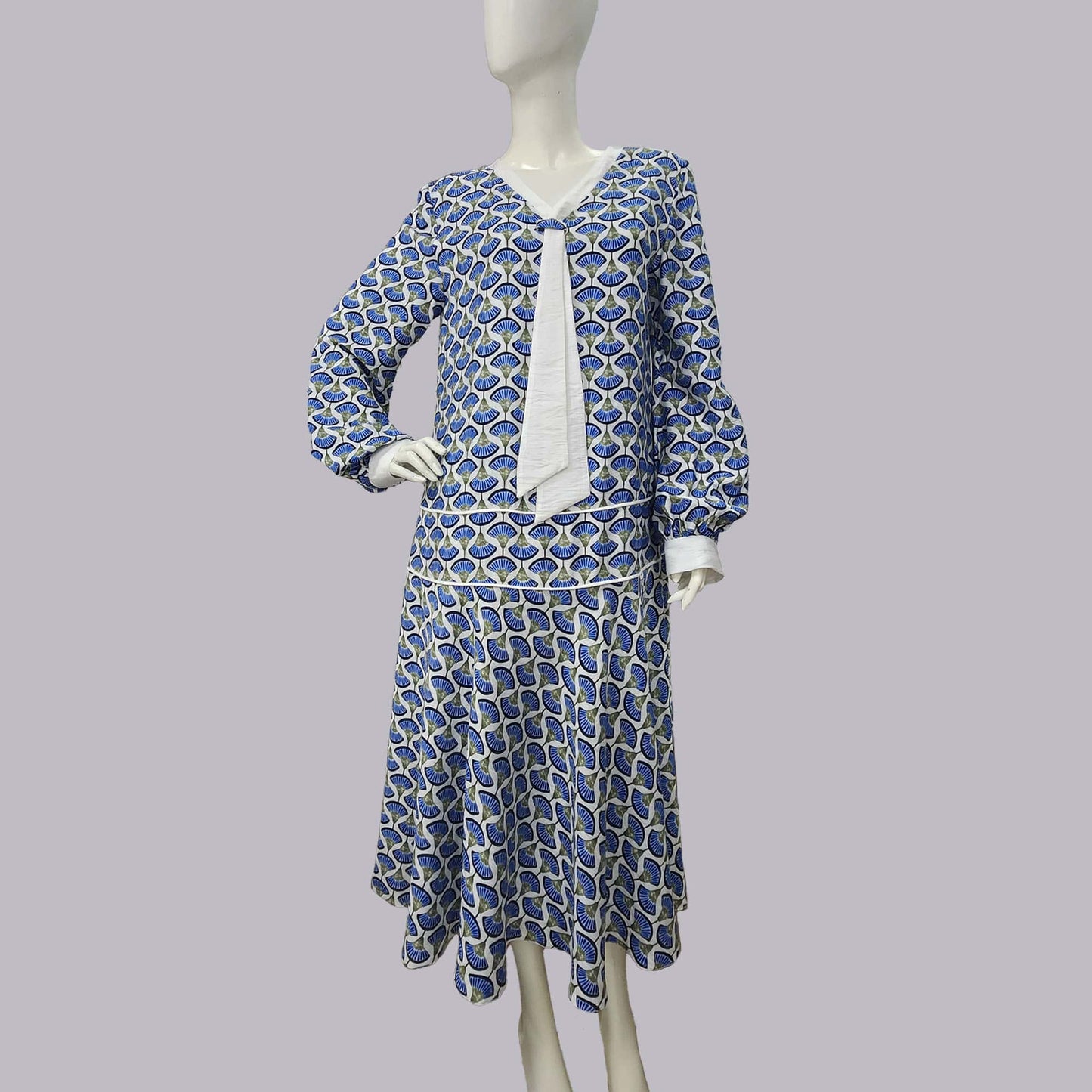 1920s Style Blue Palm Leaf Print Dress with White Tie
