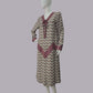 Art Deco dress in dark brown print rayon with mauve zig zag detail