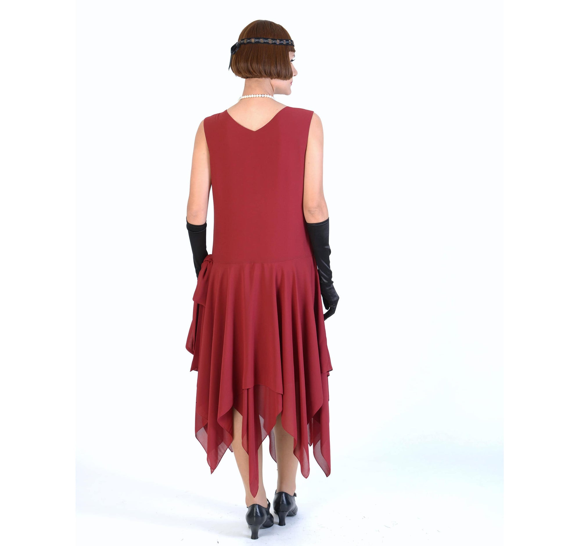 This 1920s evening formal dress, or Charleston dance dress or Great Gatsby party dress,  with handkerchief skirt is made of maroon red chiffon. 