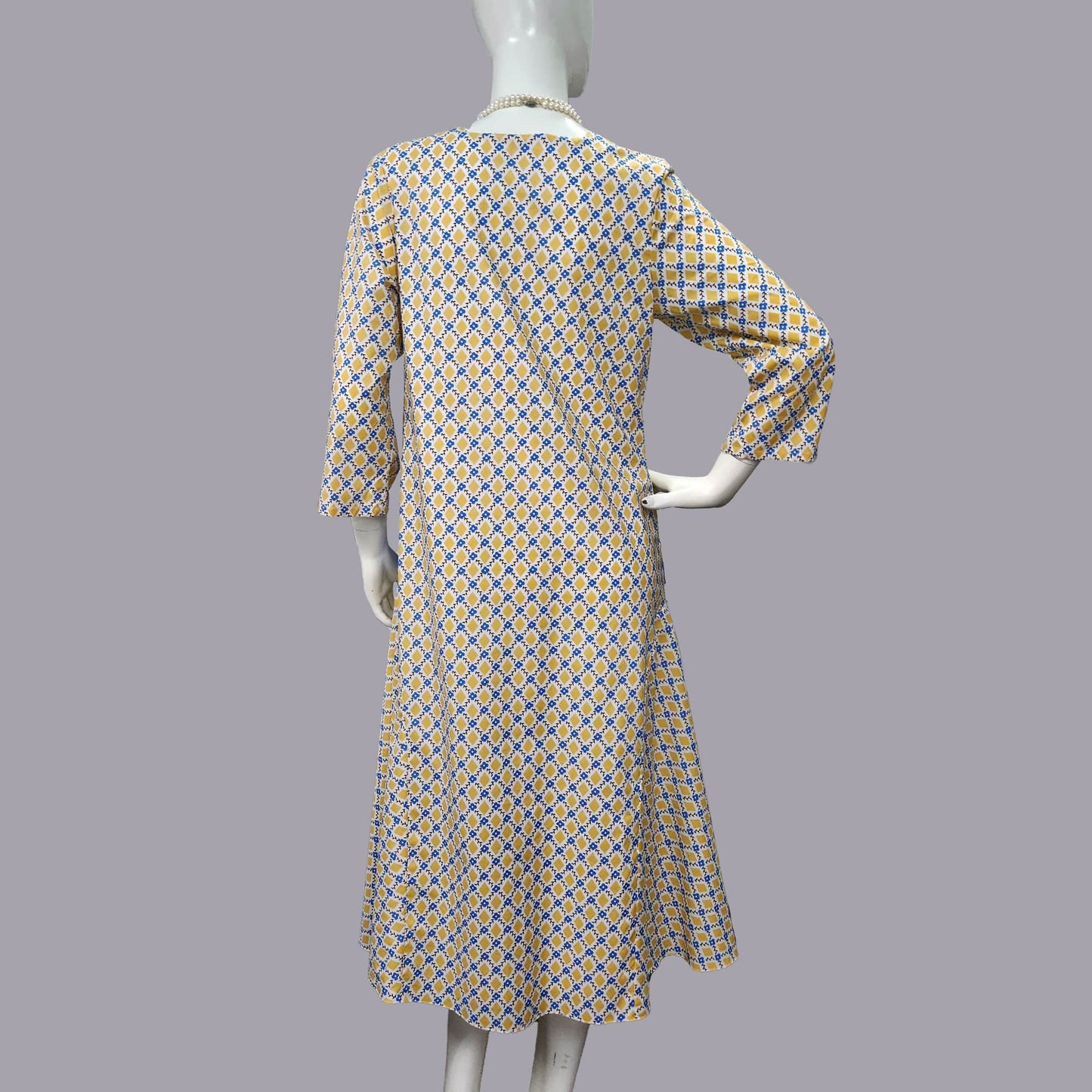 1920s dress in mustard diamond print and dark blue contrast panels