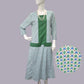 Cotton 1920s day dress in green & white diamond print and green panels