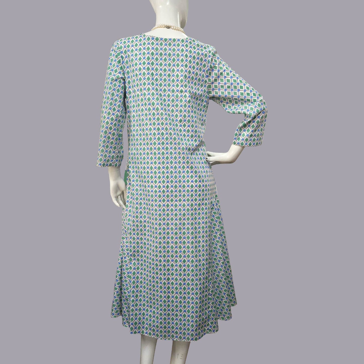 1920s dress in green & white diamond print and dark blue panels