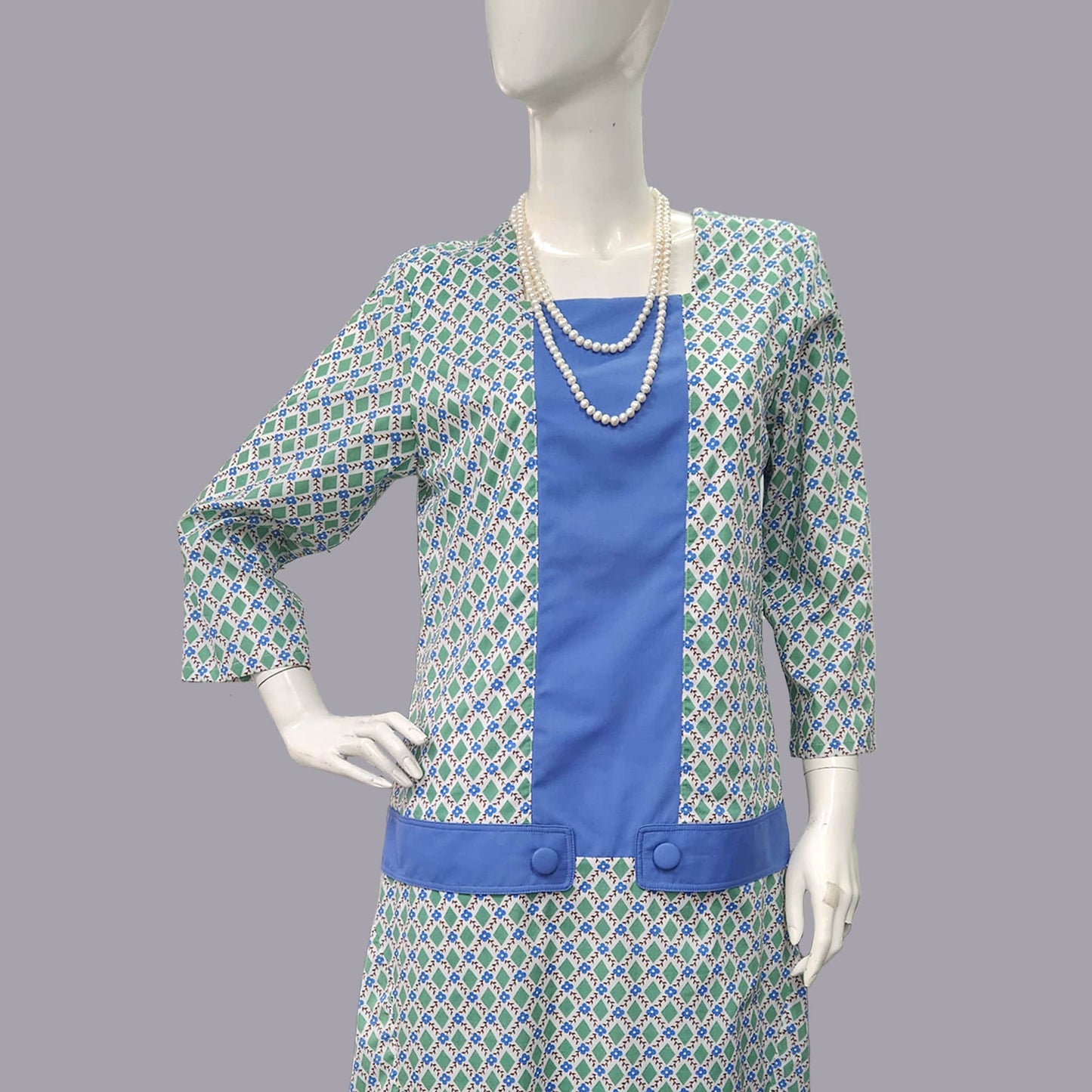 1920s dress in green & white diamond print and light blue panels
