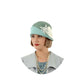 1920s-inspired linen cloche hat in muted green and pastel blue - a roaring twenties hat