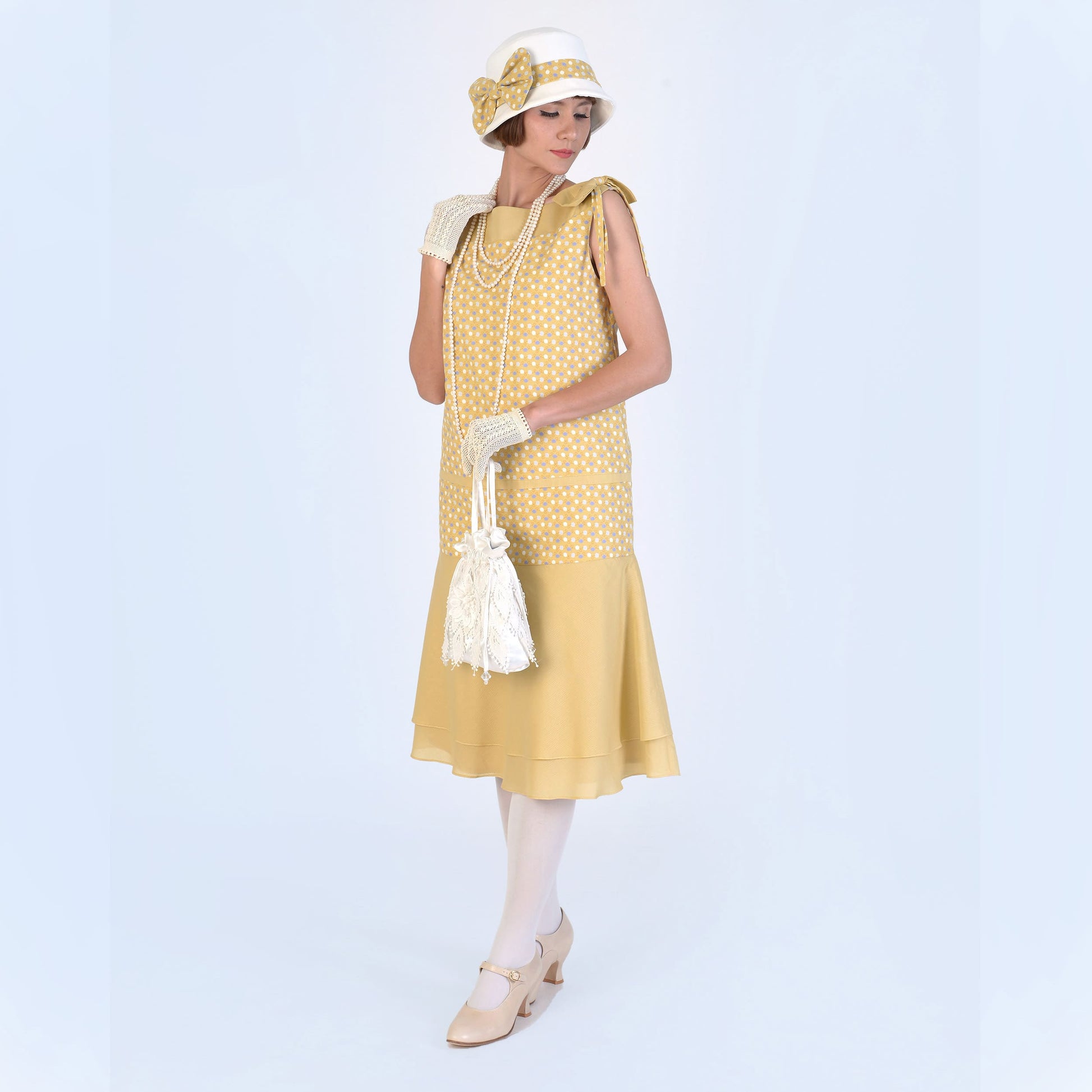 1920s cloche hat is made of off-white and light mustard cotton, to be worn as a Gatsby hat, Downton Abbey hat or flapper hat. 