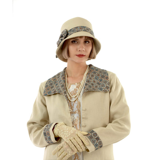 Light brown linen 1920s hat with hat band and bow. This cloche hat can be worn as a Downtown Abbey hat, Great Gatsby day hat or flapper hat.
