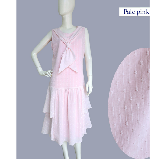 Sleeveless cotton 1920s dress in pale pink with tiered skirt