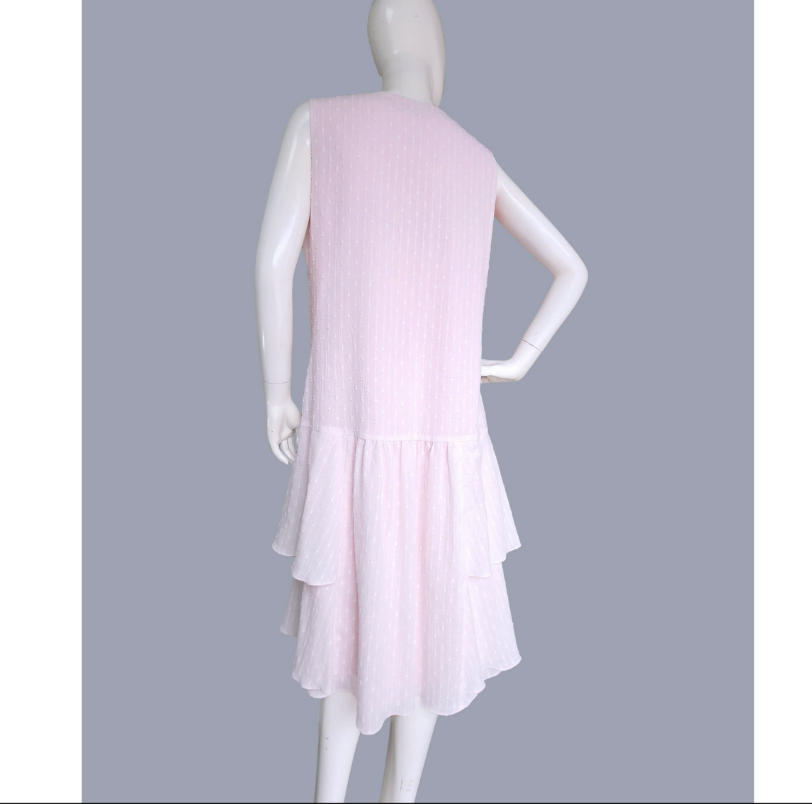 Sleeveless cotton 1920s dress in pale pink with tiered skirt