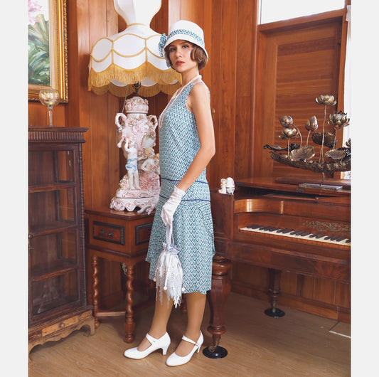 Light blue chiffon flapper dress with deco print and ruffled skirt. The roaring 20s dress can be worn as Great Gatsby dress, flapper dress or 1920s high tea dress.