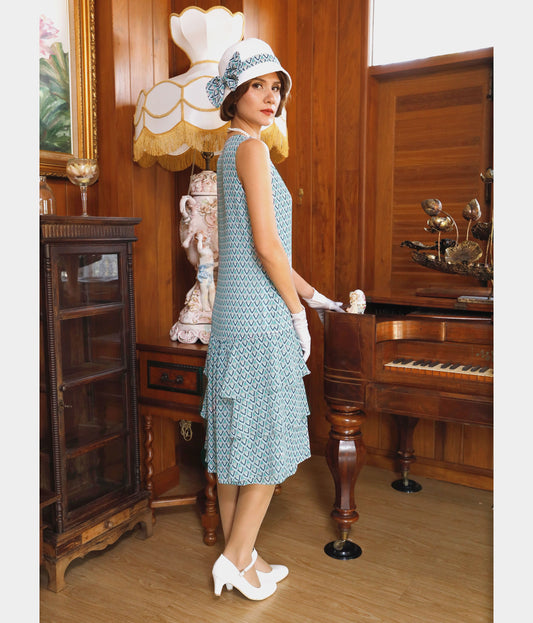 Light blue chiffon 1920s fashion dress with tiered skirt. The flapper can be worn as Downton Abbey dress, 1920s day dress or a Great Gatsby summer dress.