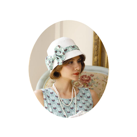 1920s cloche hat with off-white cotton and printed light green chiffon - a roaring twenties hat