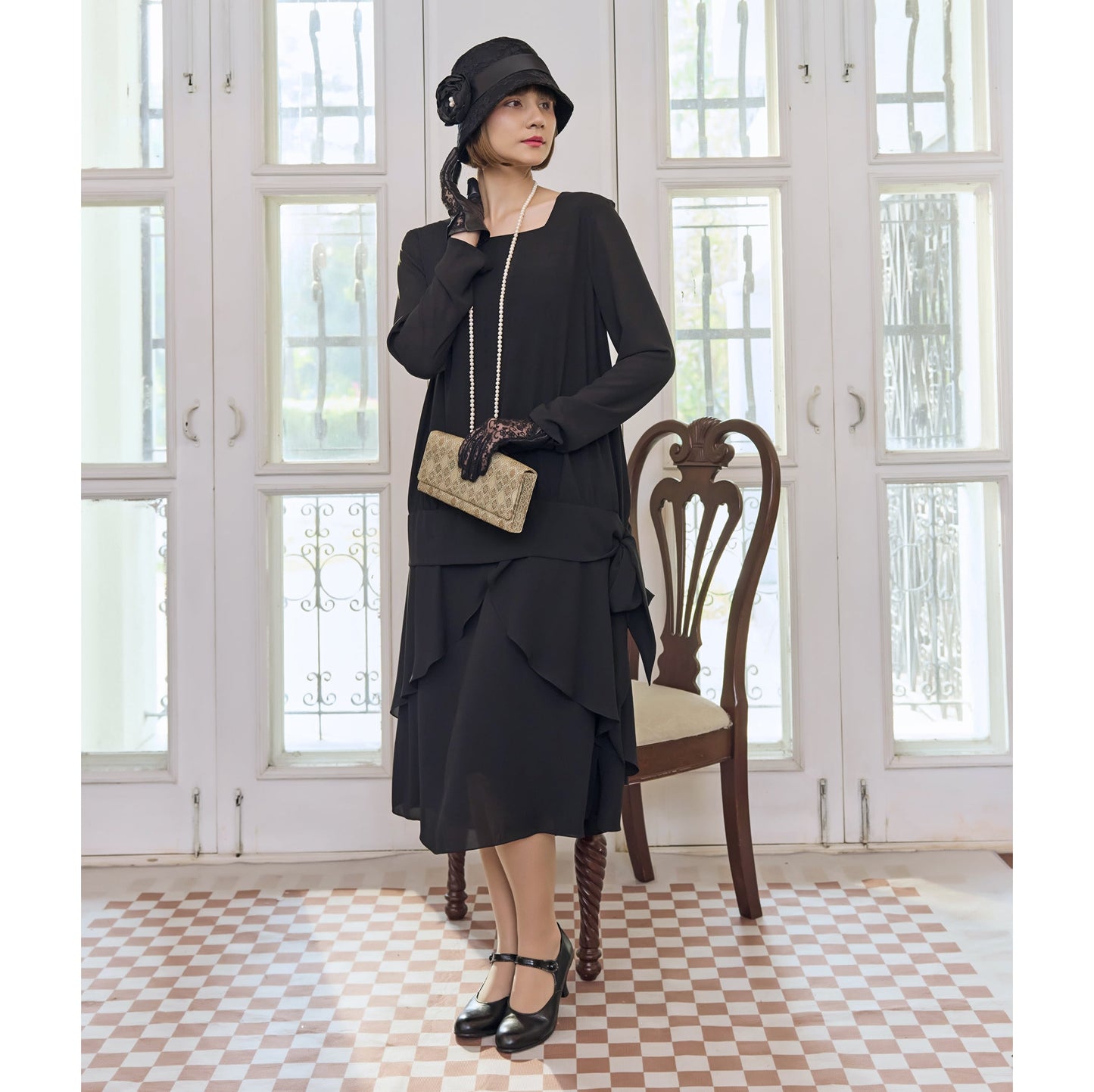 1920s style two-piece dress made of black chiffon with long sleeves