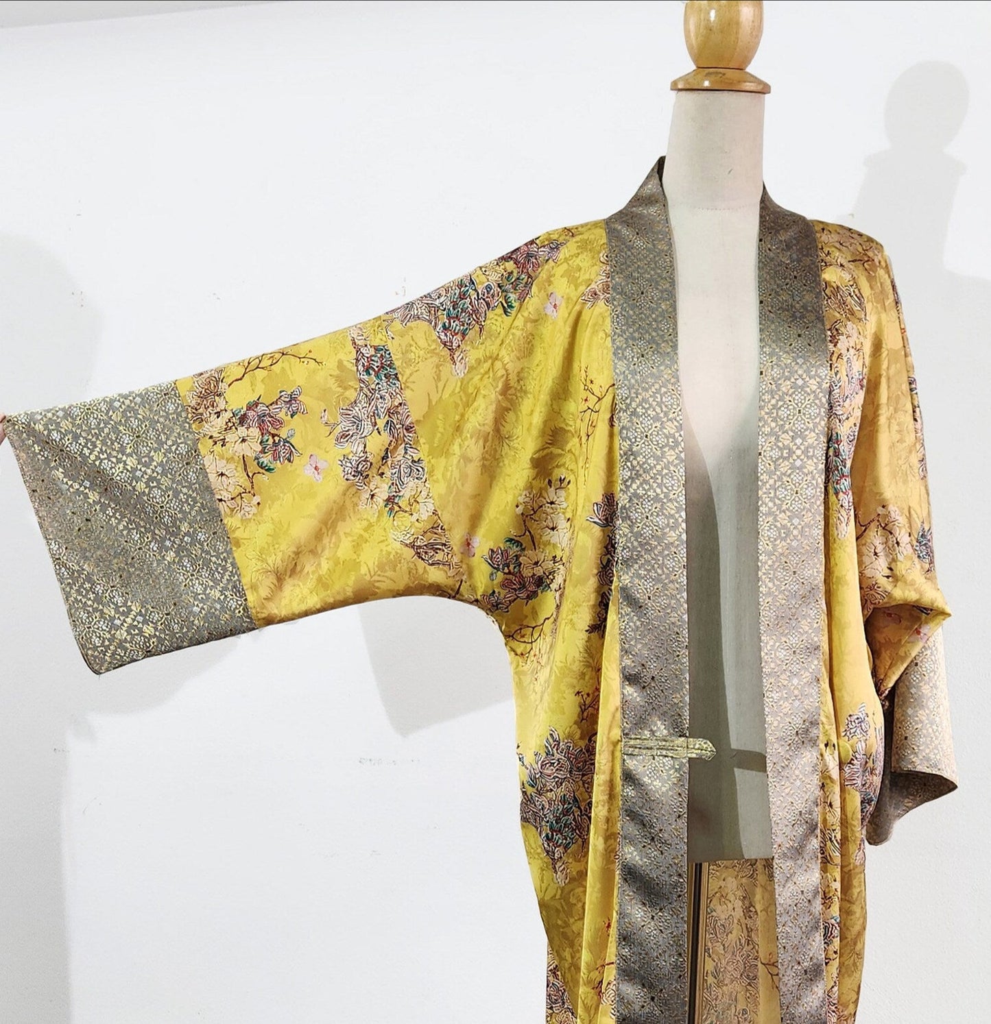 Kimono robe in printed yellow satin inspired by 1920s loungewear fashion, a Japanese golden robe