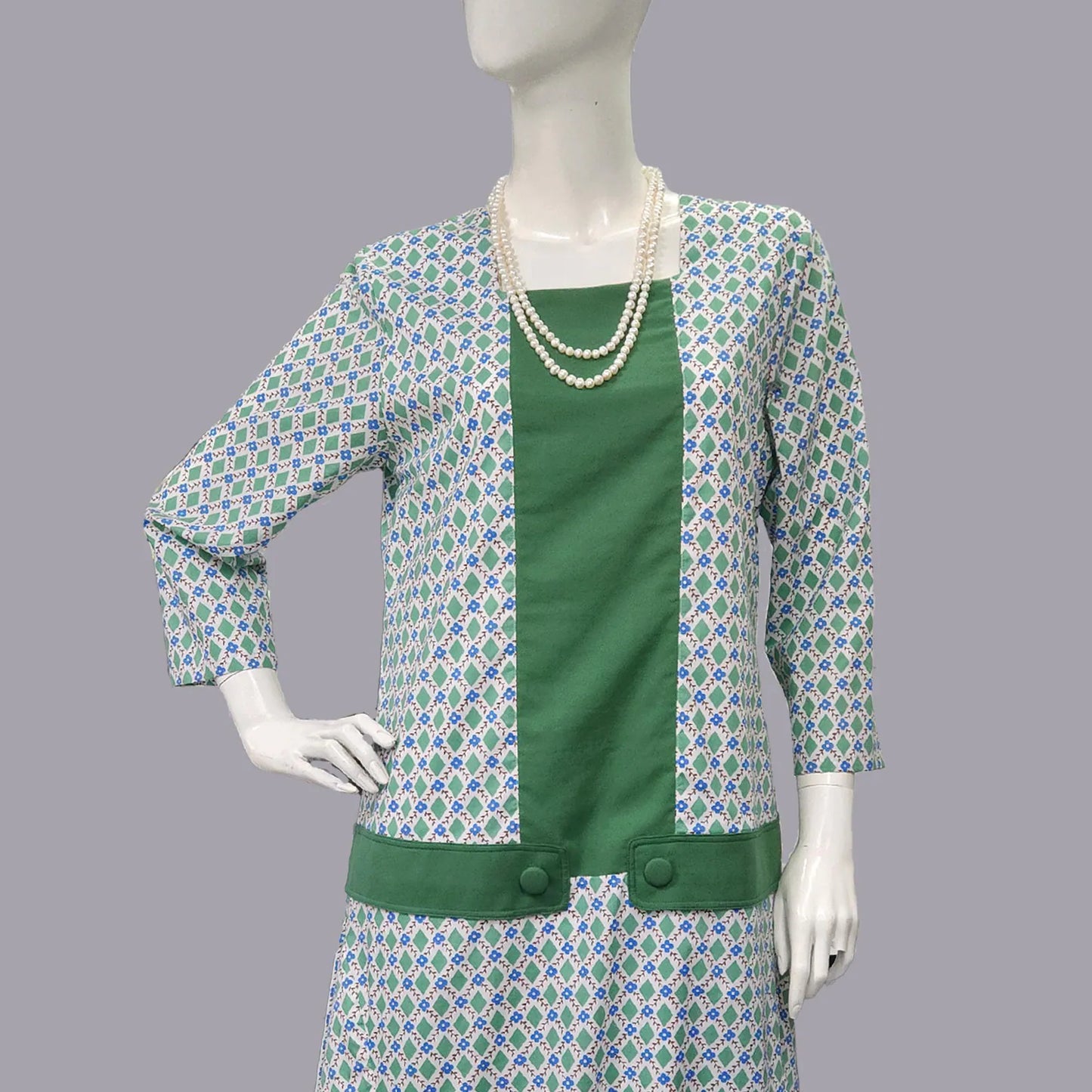 Cotton 1920s day dress in green & white diamond print and green panels