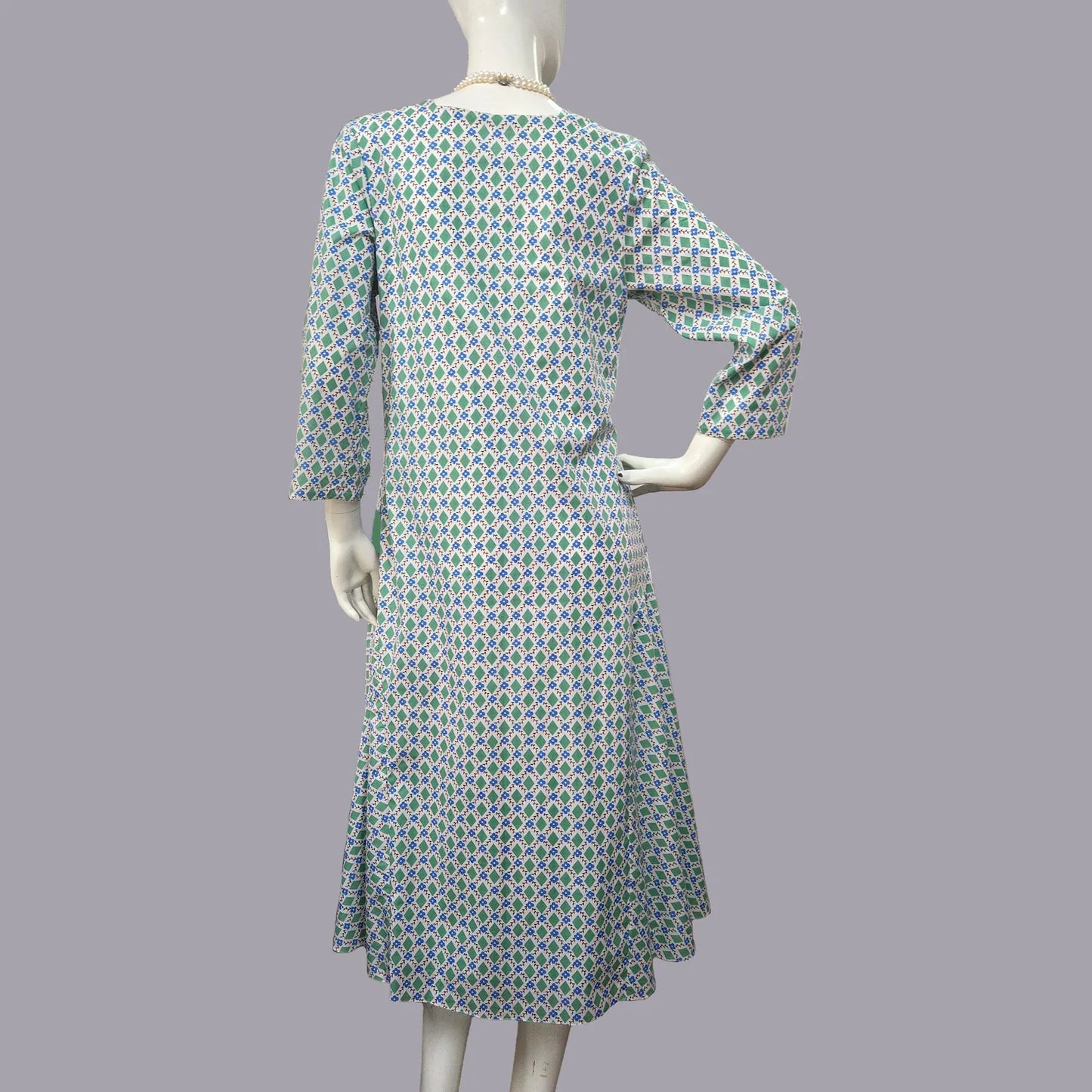 1920s dress in green & white diamond print and light blue panels