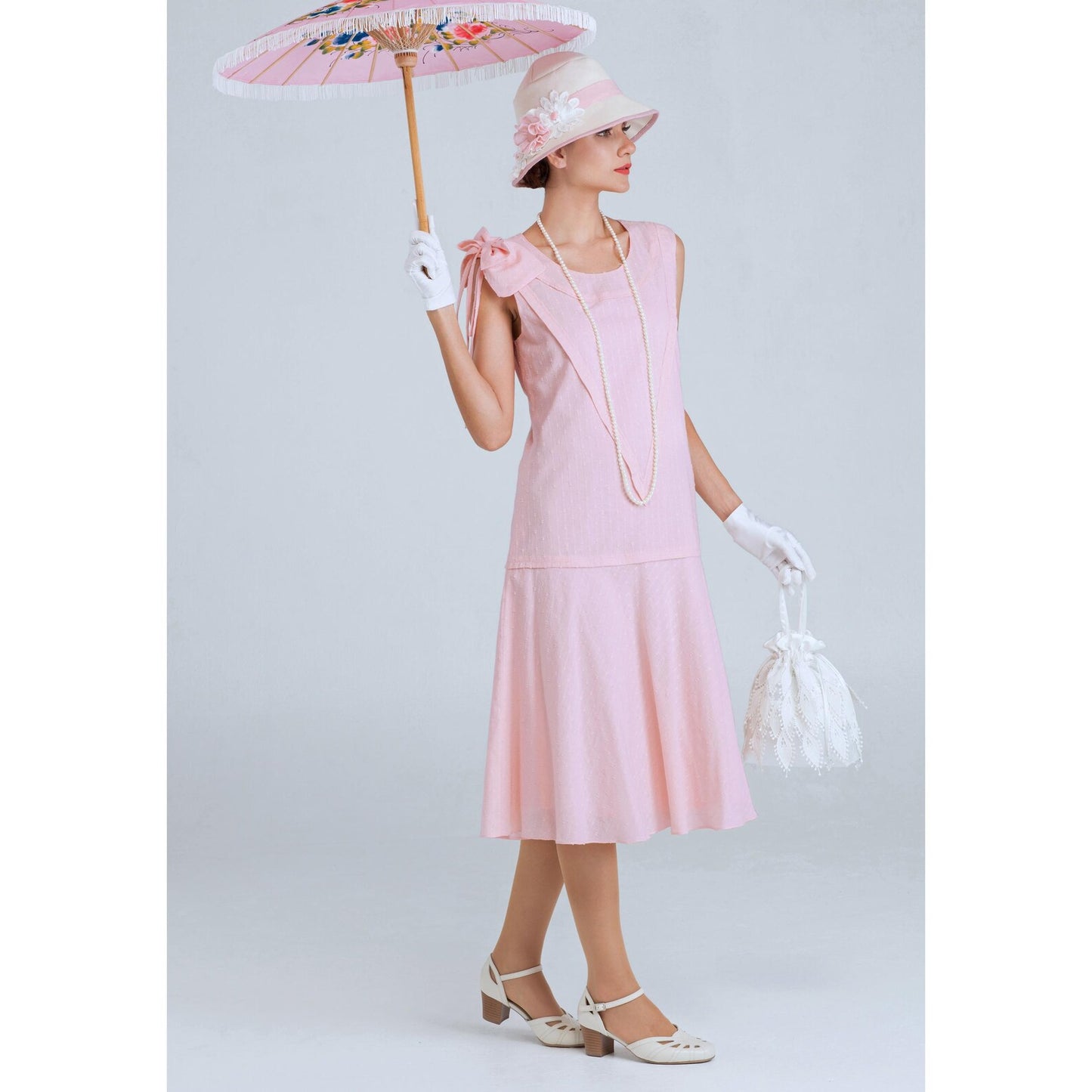 Downton Abbey dress of pale peach or pale pink cotton wth shoulder bow