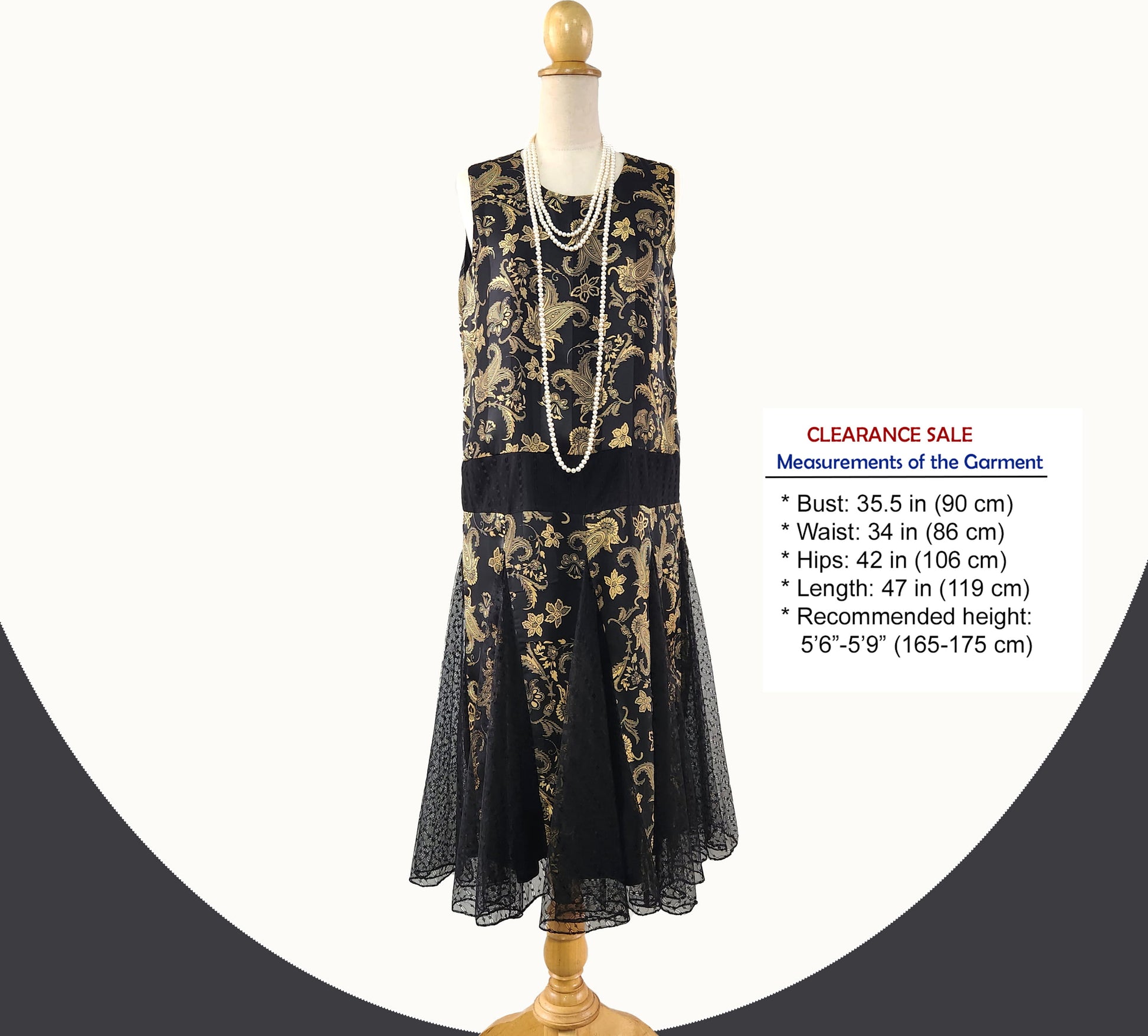 1920s evening dress in gold and black satin with black skirt godets